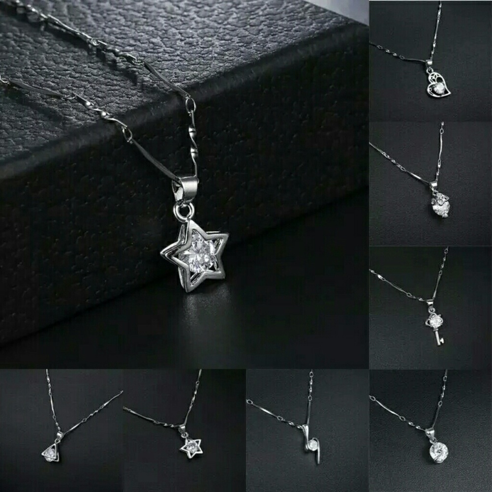 Silver cubic zirconia starburst necklace